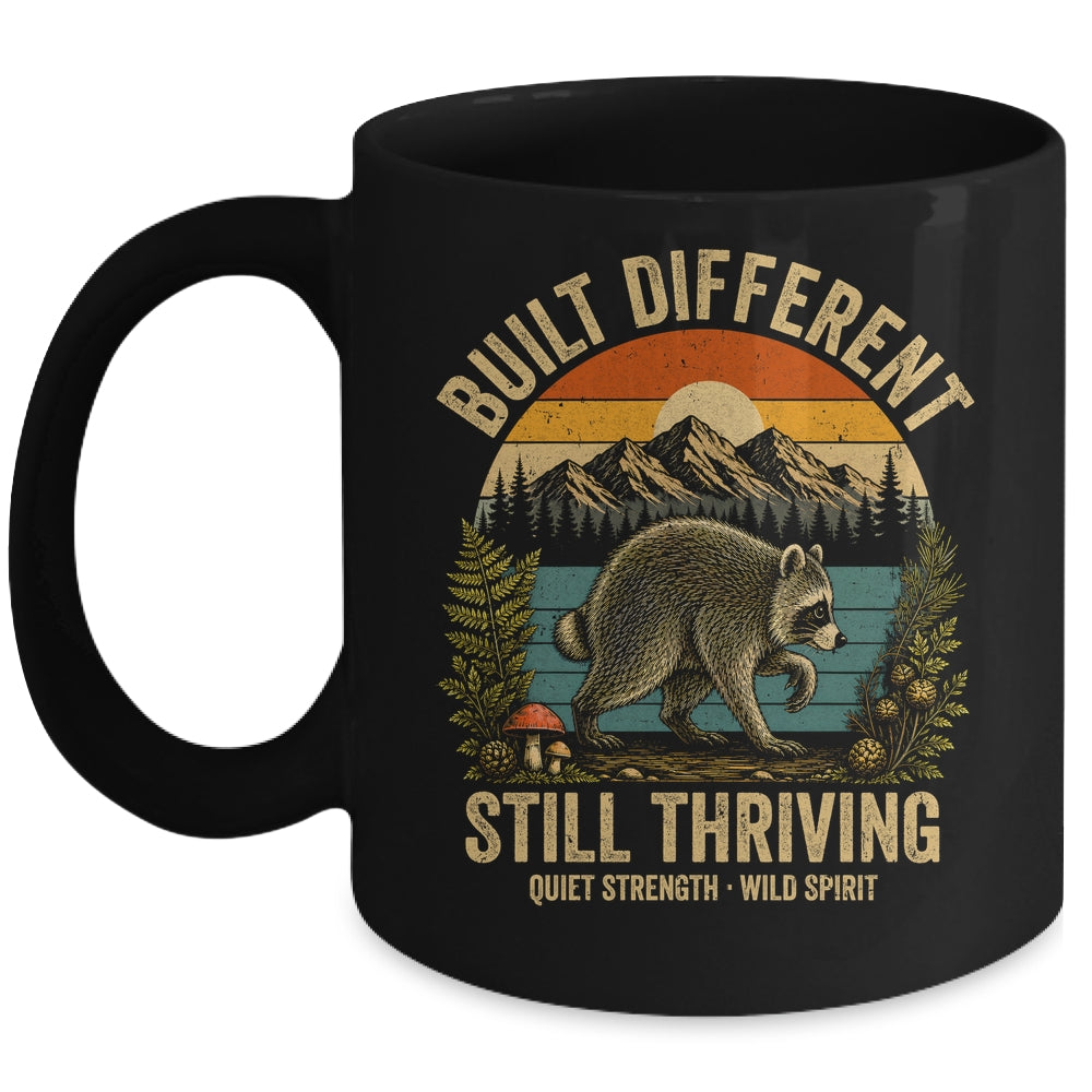Built Different Still Thriving Raccoon Funny Vintage Mug | teecentury