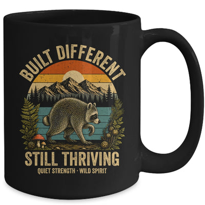 Built Different Still Thriving Raccoon Funny Vintage Mug | teecentury