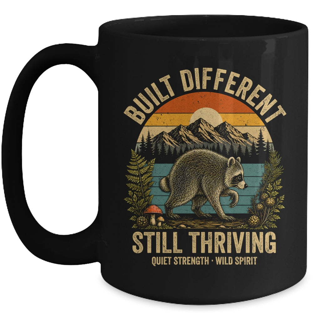Built Different Still Thriving Raccoon Funny Vintage Mug | teecentury