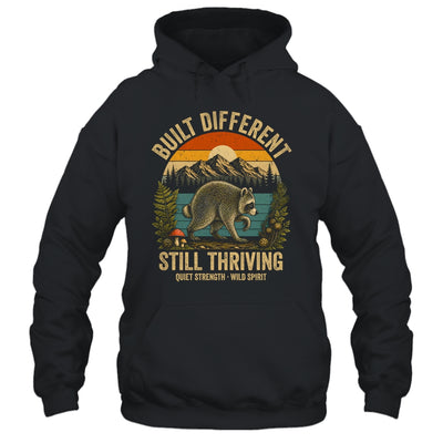 Built Different Still Thriving Raccoon Funny Vintage Shirt & Tank Top | teecentury