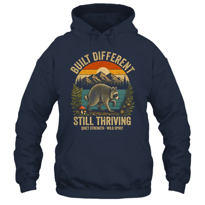Built Different Still Thriving Raccoon Funny Vintage Shirt & Tank Top | teecentury