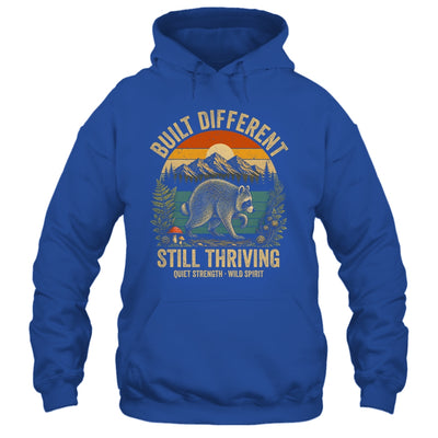 Built Different Still Thriving Raccoon Funny Vintage Shirt & Tank Top | teecentury