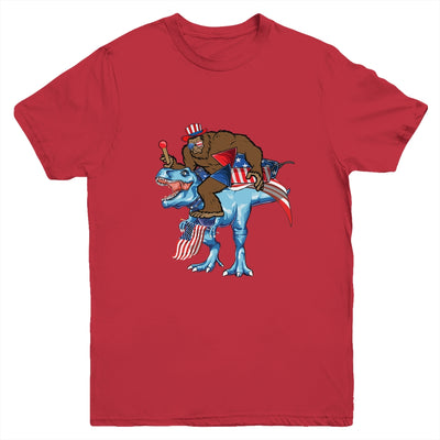 Bigfoot riding Dinosaur USA Flag 4th Of July America Youth Youth Shirt | Teecentury.com