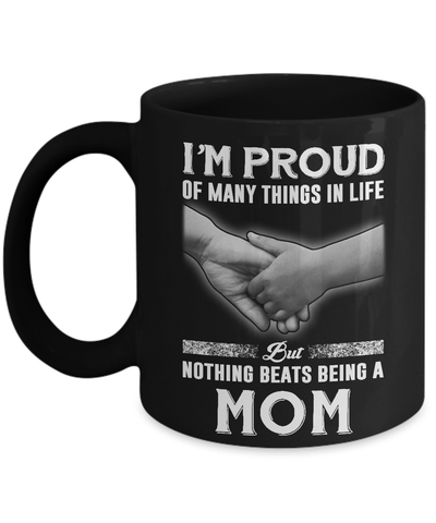 Proud Of Many Things In Life Nothing Beats Being A Mom Mug Coffee Mug | Teecentury.com