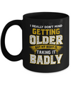 I Really Don't Mind Getting Older But My Body Is Taking It Badly Mug Coffee Mug | Teecentury.com